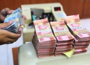 Rupiah Dtutup Melemah Sejalan dengan Pelemahan Dolar AS